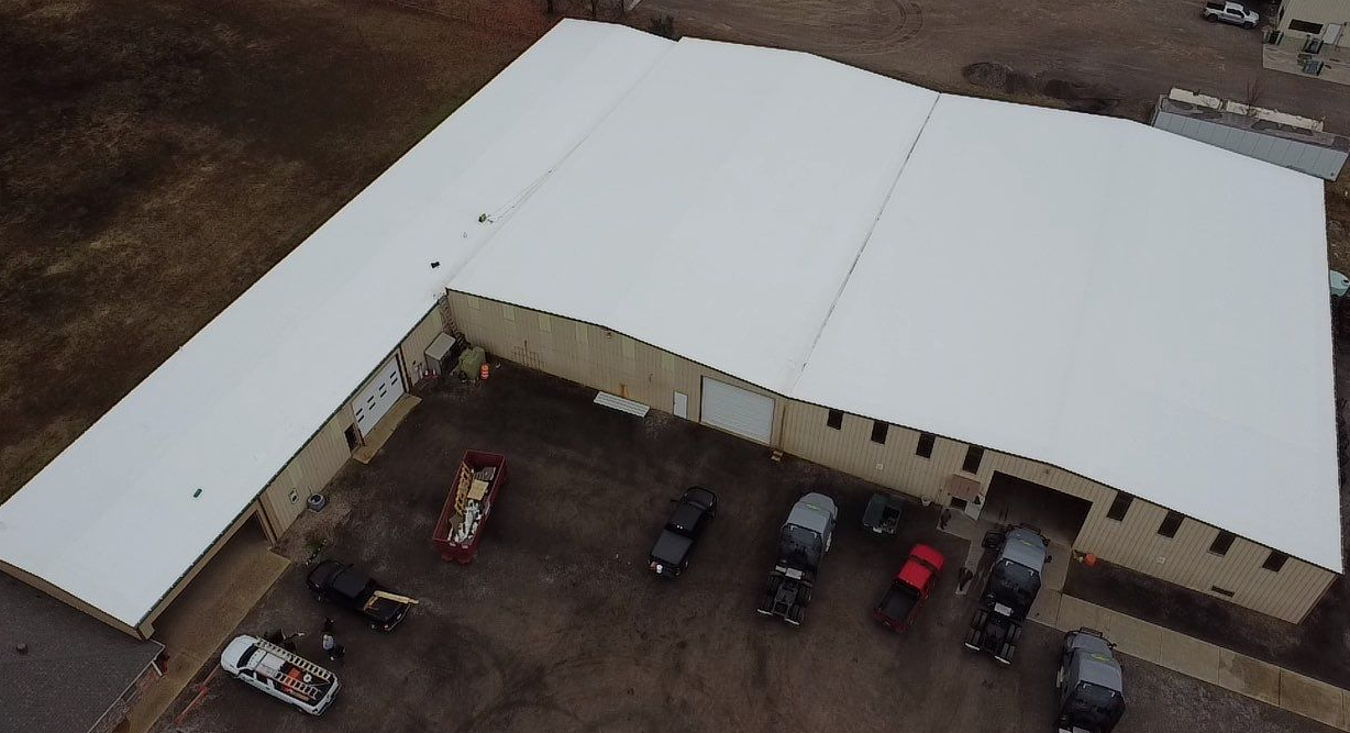 Commercial flat roof coating aerial view
